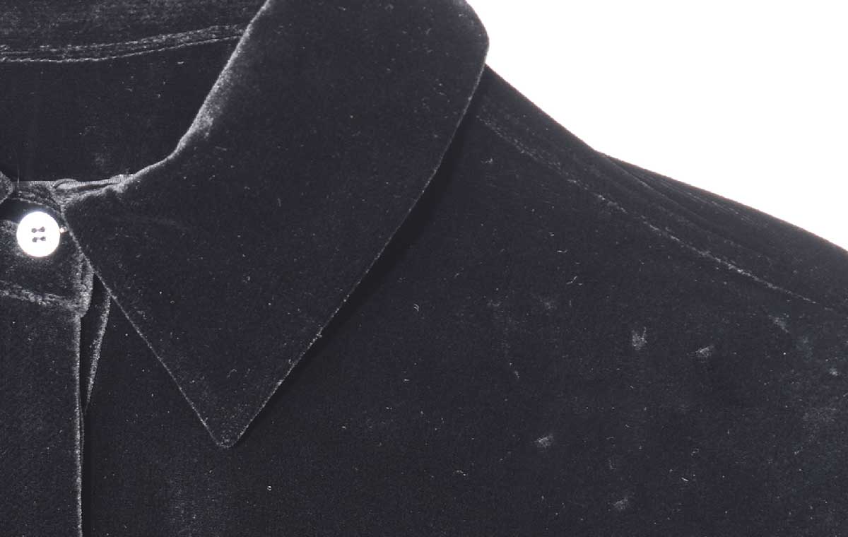Professional lint removal service for black clothing photography